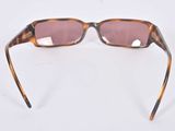the glasses are made of tortoises and have pink tinted lenses
