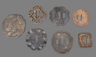 six different types of iron tsubai and other metal objects