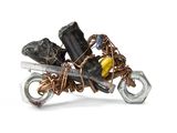 a picture of a motorcycle made out of wire and nuts
