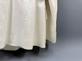 a white robe on a mannequin mannequin mannequin mannequin mannequin mannequin mannequin mannequin mann