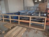 several pallets of wood are stacked up in a warehouse