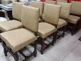 a lot of chairs that are lined up in a room