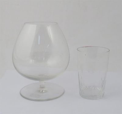 a glass of water and a glass of wine on a table