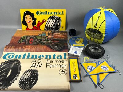 Une image représentant un livre, un ballon et d'autres objets posés sur une table