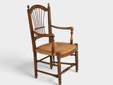 une vieille chaise en bois avec un dossier et une assise en rotin, sur fond blanc