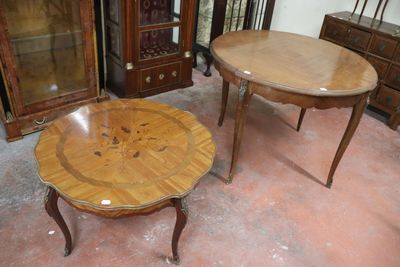 two tables and a cabinet in a room
