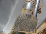 a close up of a gun that is on display