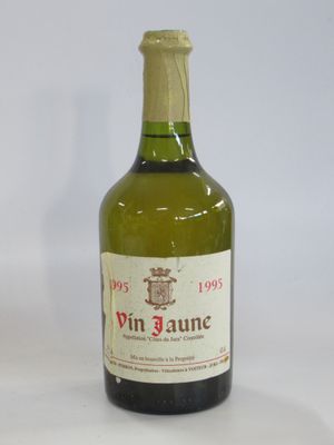 a bottle of wine that is sitting on a table
