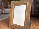 a picture of a picture frame sitting on the floor
