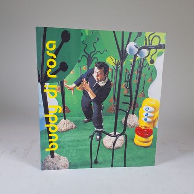 a card with a picture of a man doing a trick on a skateboard
