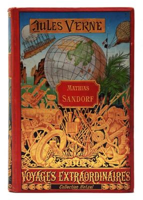 un vieux livre dont la couverture représente un globe terrestre
