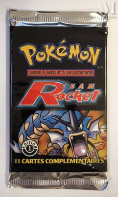 a close up of a pack of pokemon trading cards on a table