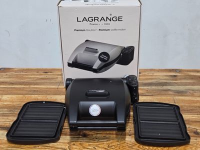 an image of a box of luggage sitting on top of a wooden table