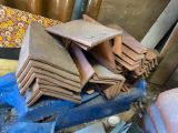 many pieces of wood stacked on top of each other