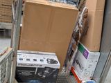 a box that is sitting on the ground next to some boxes