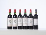 six bottles of red wine lined up in a row