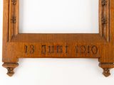 a picture of a wooden picture frame with a clock on it