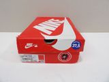 a red box with a white nike logo on it