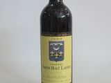 a bottle of wine that is sitting on a table