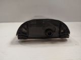 a close up of a small black object on a table