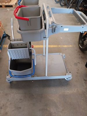 a picture of a cart with two buckets on it
