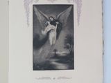 an old book with a picture of an angel on it