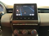 the dashboard of a car with a gps device in the center