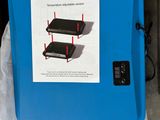 a blue box with a picture of a blue heat plate on it
