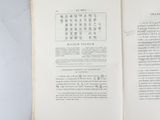 an open book with chinese writing on it