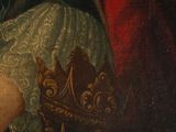 portrait of a woman in a blue dress with a gold crown