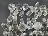 a lot of glass bottles that are sitting on a table