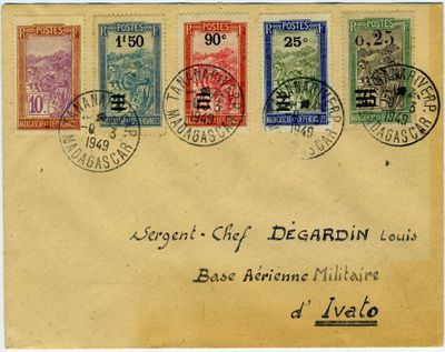an old postcard with four different stamps on it