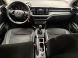 the interior of a car with a steering wheel, dashboard and dashboard controls