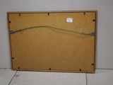 a picture of a piece of cardboard with a string attached to it