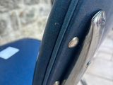 an image of a chair with a blue seat and back