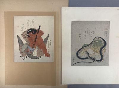 two asian paintings of a monkey and a snake on a wall