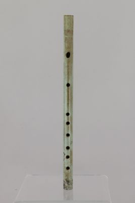an image of a flute that is on a stand