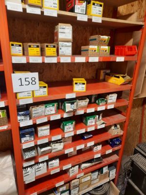 a shelf with many different types of items on it