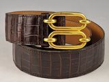 brown alligator skin belt with gold buckle