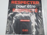 une affiche accrochée au mur sur laquelle on peut lire : « Respecter pour être respecté »