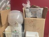 many boxes and containers that are on a table