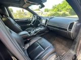 the interior of a car with black leather seats and dashboard