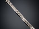 a diamond bracelet, by cartier
