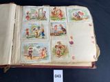 an open book with pictures of children on it