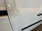 a close up of a car door handle with a sticker on it