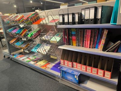 many books on the shelves in the store