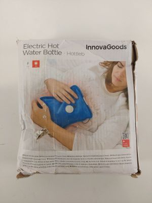 emballage d'une bouillotte électrique en forme de femme