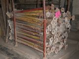 a pile of wood in the middle of a building