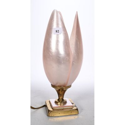 an image of a pink glass lamp with a gold base