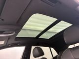 a view of the sunroof from inside of a car